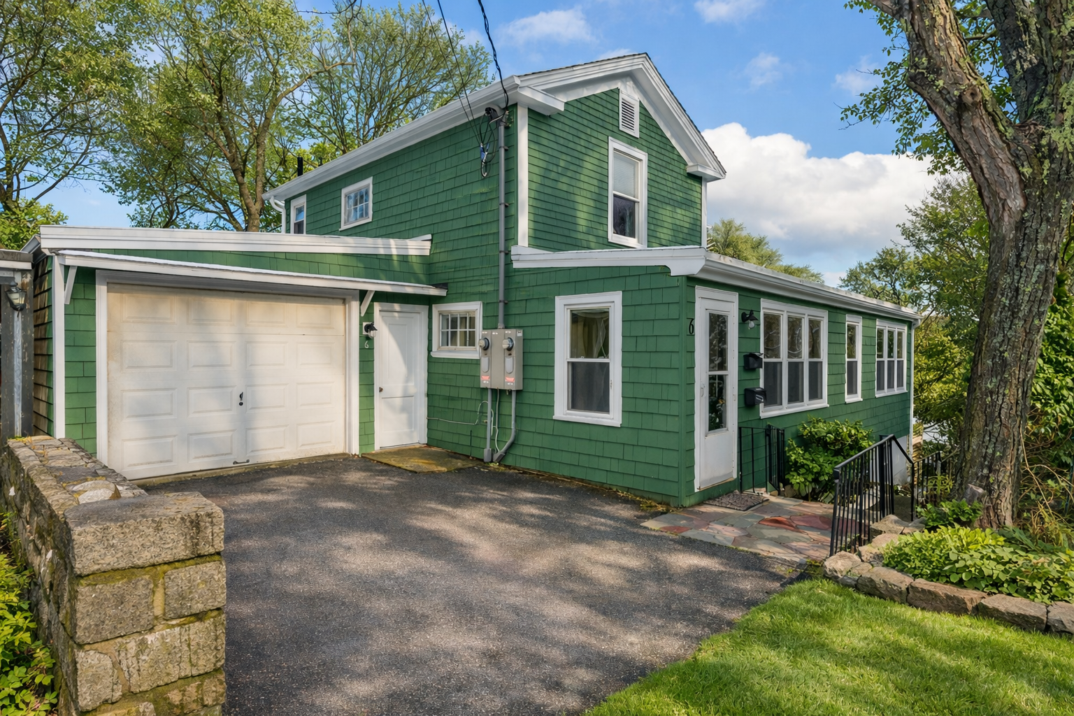 Another view of the house, with the parking space.