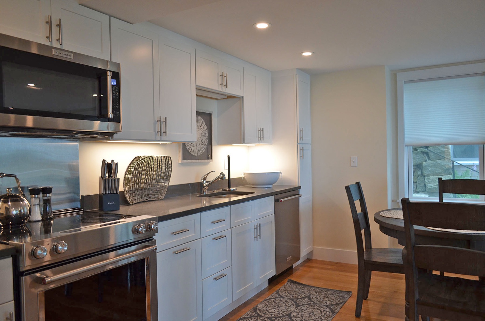 The open plan living/dining/kitchen space.