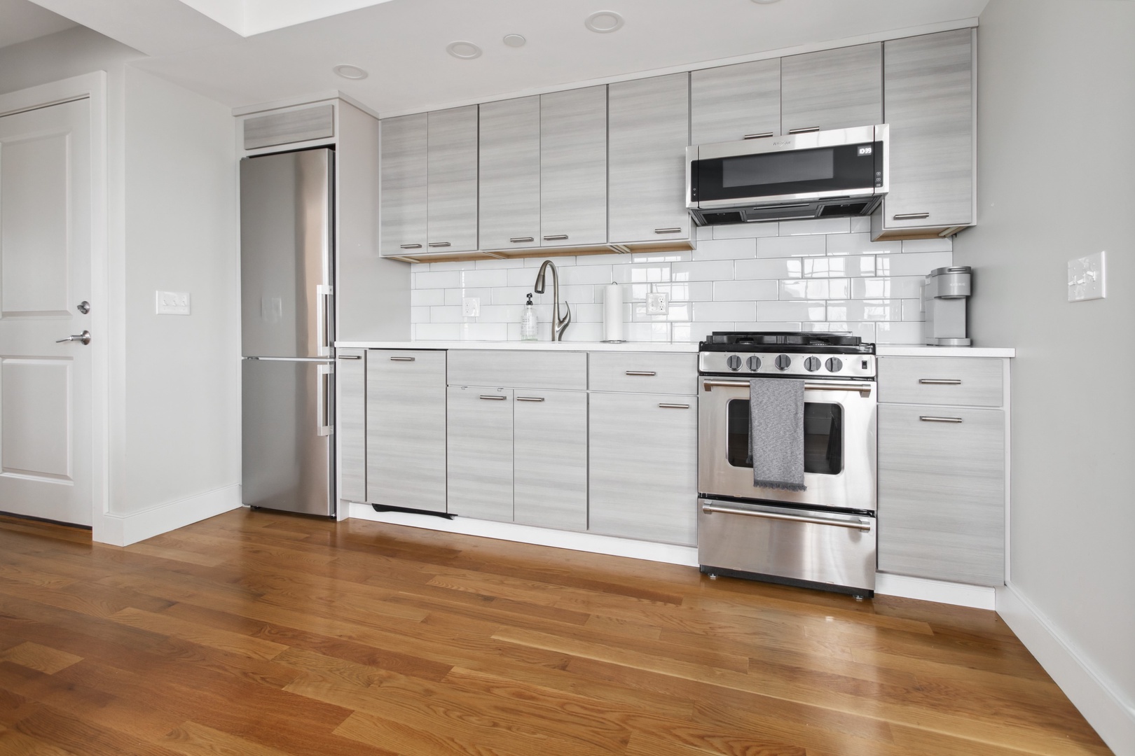 Modern kitchen with gas stove.