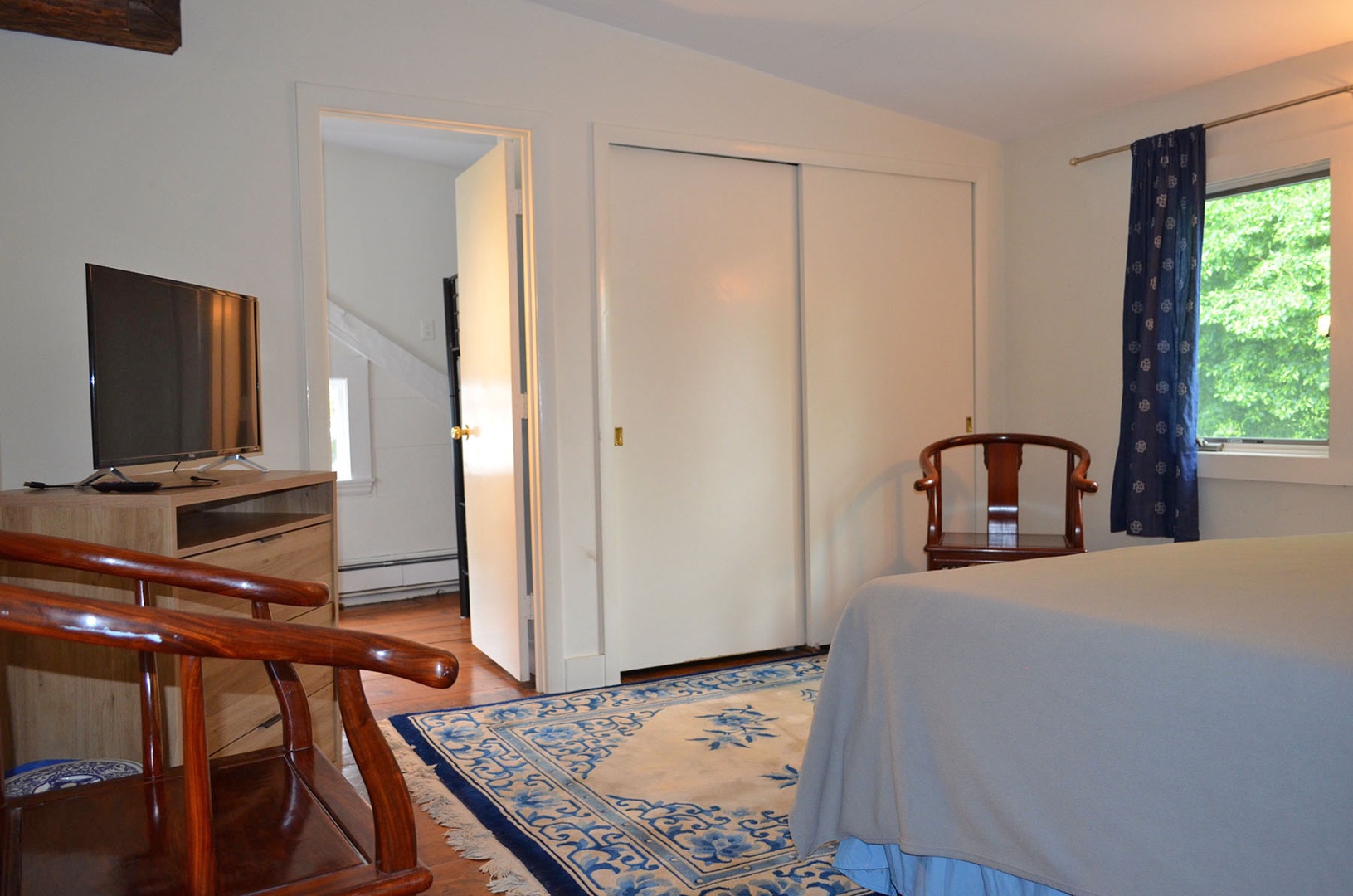 View of the Queen bedroom looking toward the third bedroom.