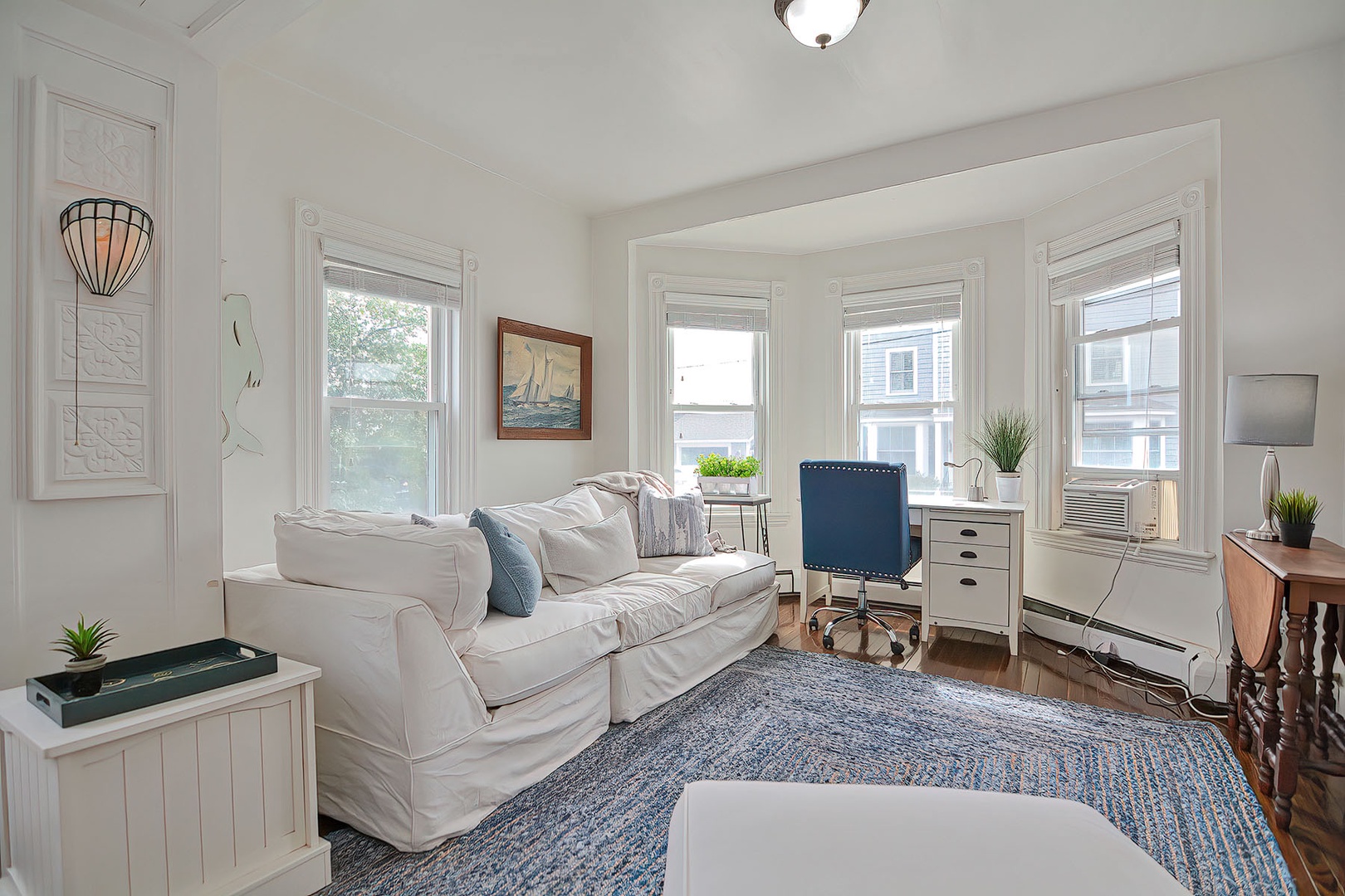 Bay windows and a desk for working remotely.