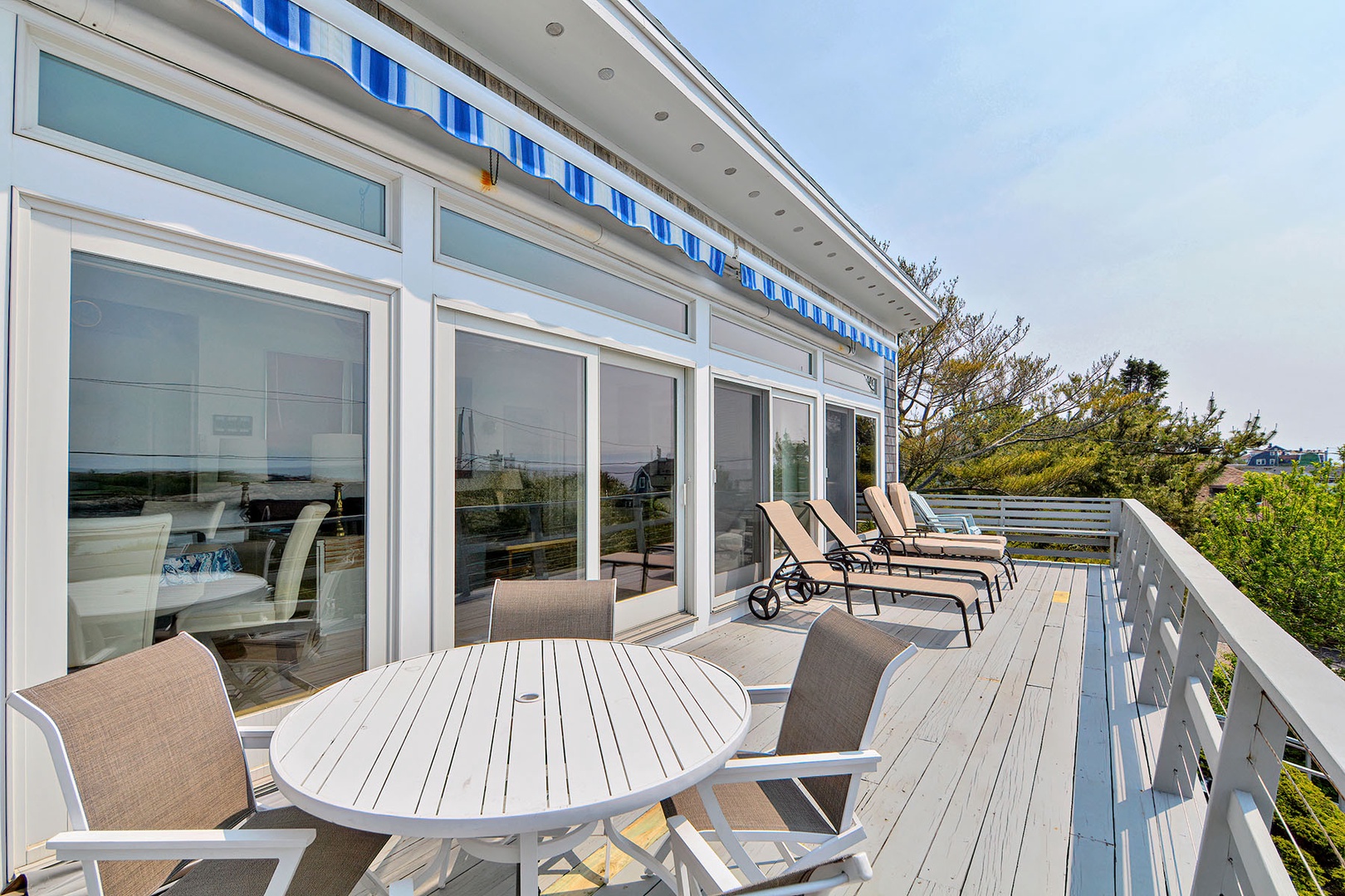 Eat or take your morning coffee on the spacious deck/
