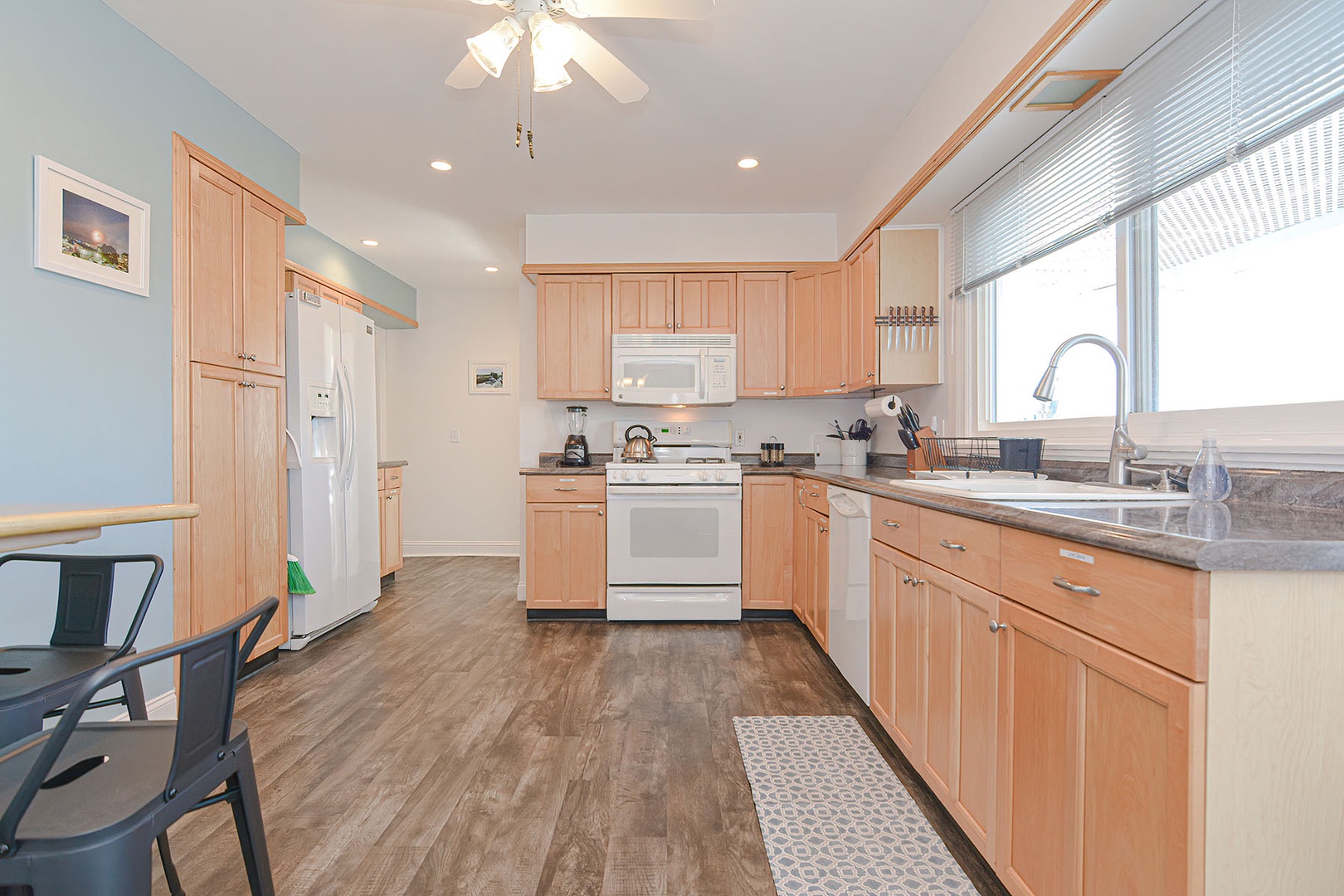 The updated kitchen is well-applianced.