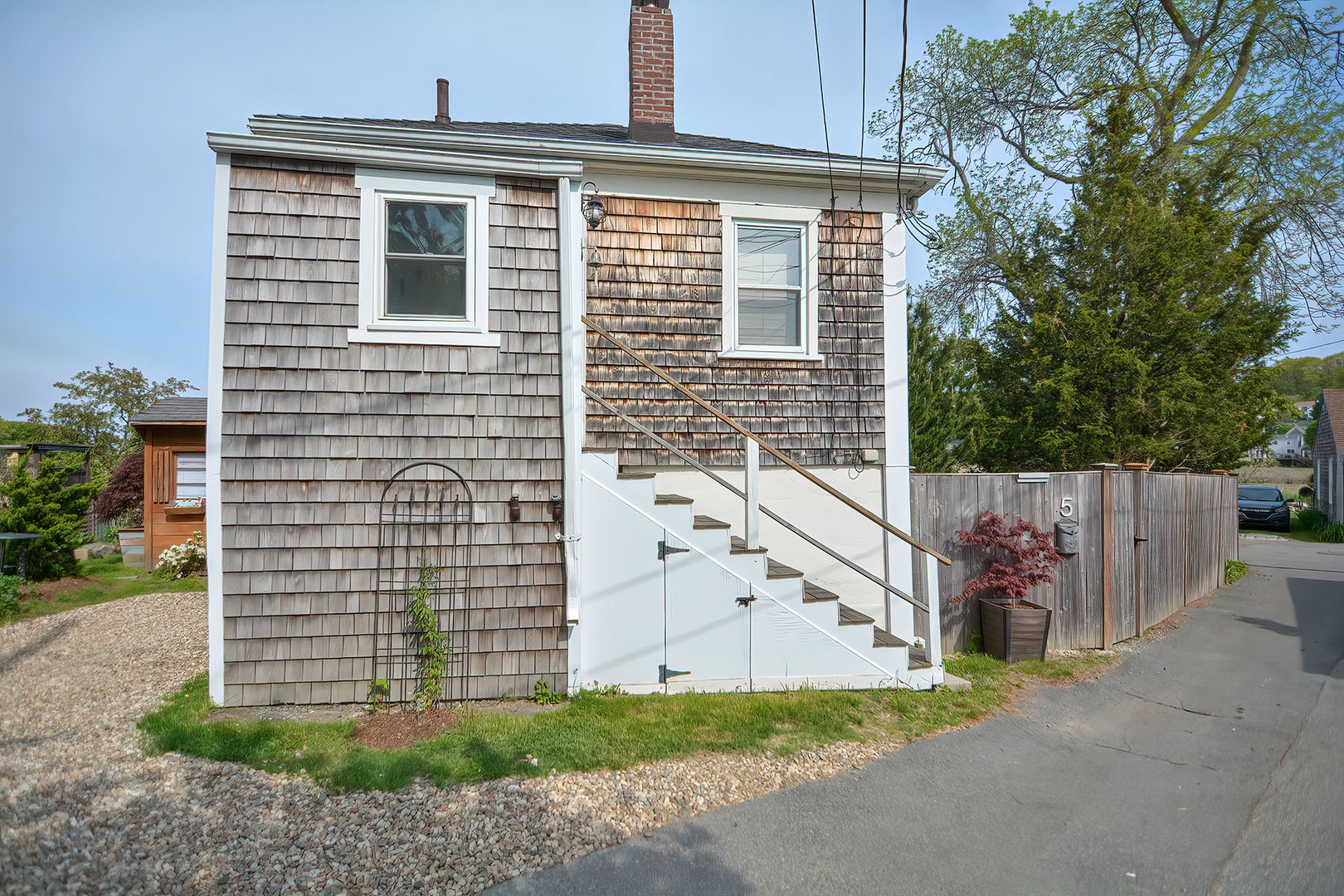 Side view of the front entrance and driveway.