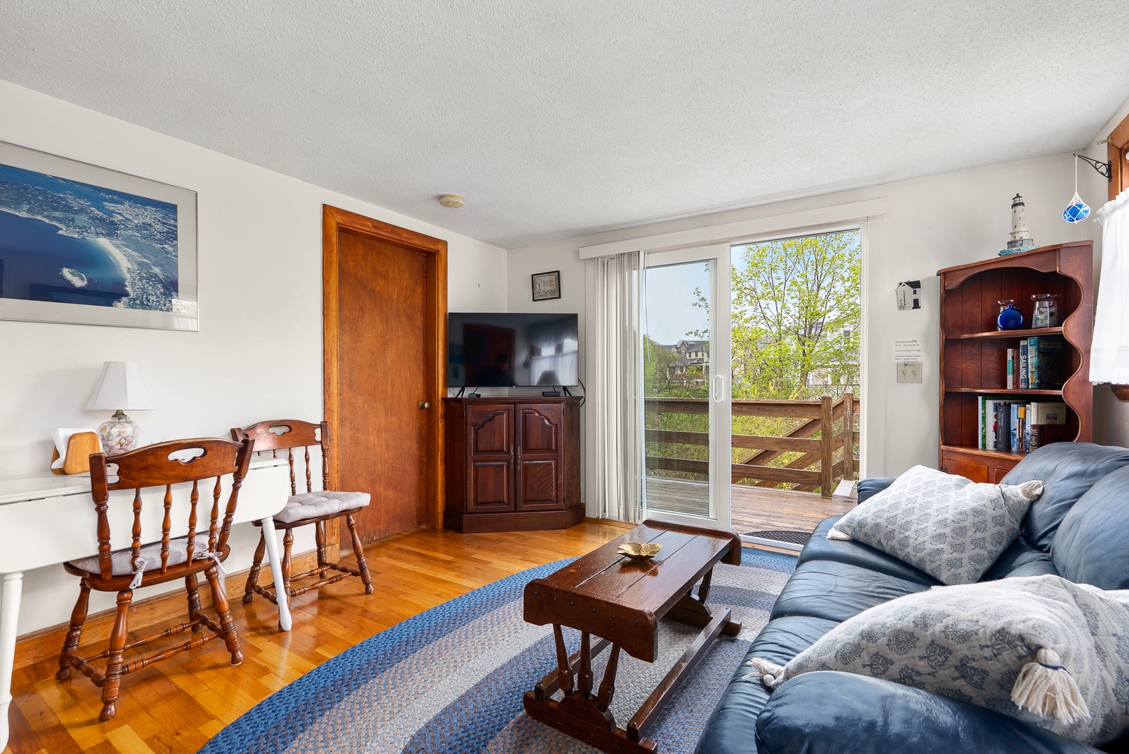 The living room has sliders to the deck.