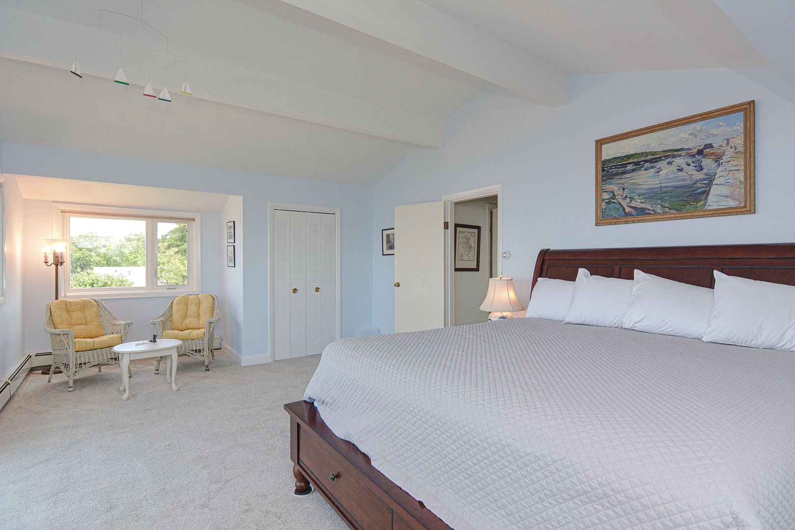 The spacious primary bedroom with King bed.