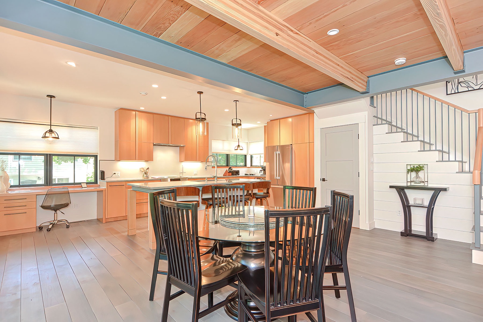 Dining table and kitchen.