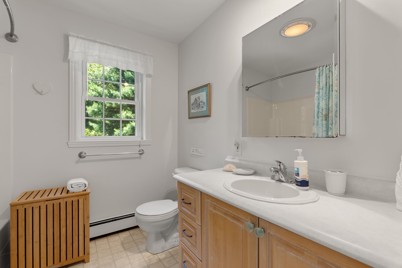 Full Bath across from the Den with walk in shower.