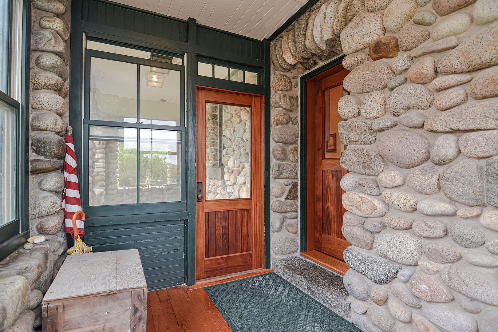 The enclosed front porch.