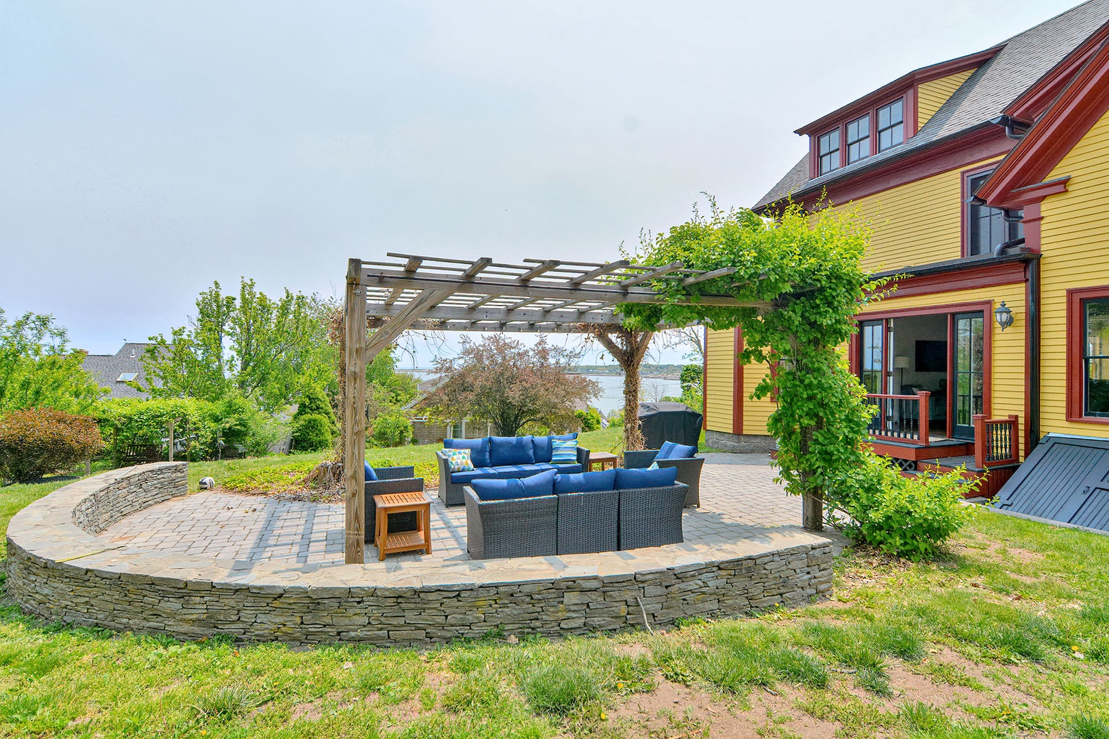 Back patio with a grill and views