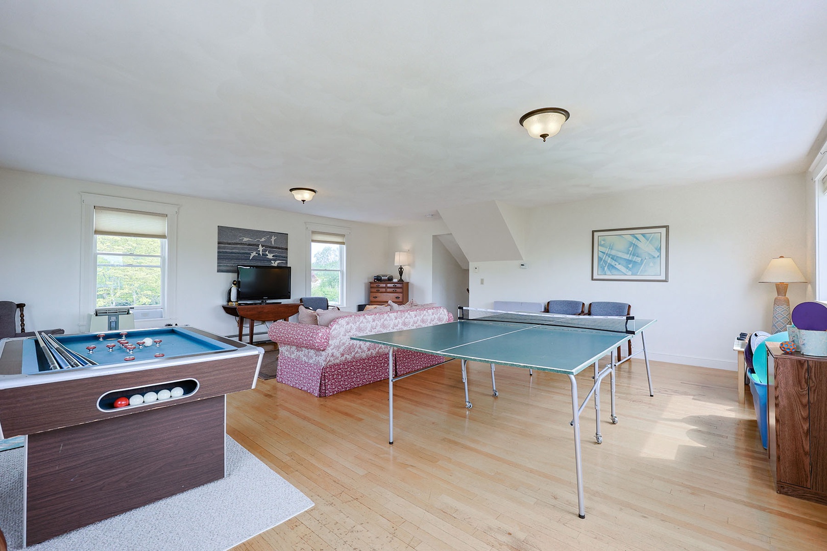 The games room offers a ping pong table and a bumper pool table.