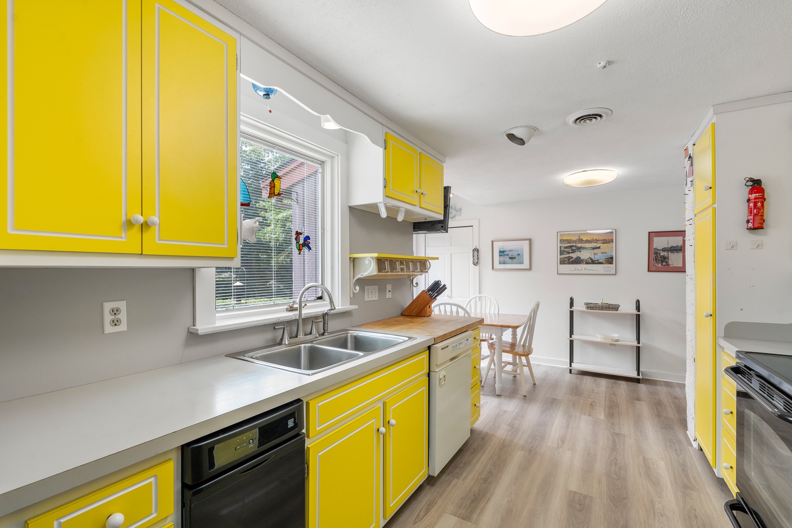 The bright kitchen overlooking the in-kitchen dining area.