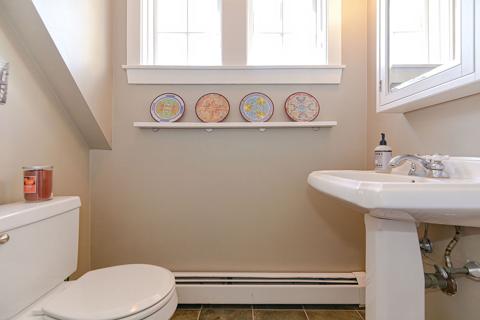 Lower level half bathroom.