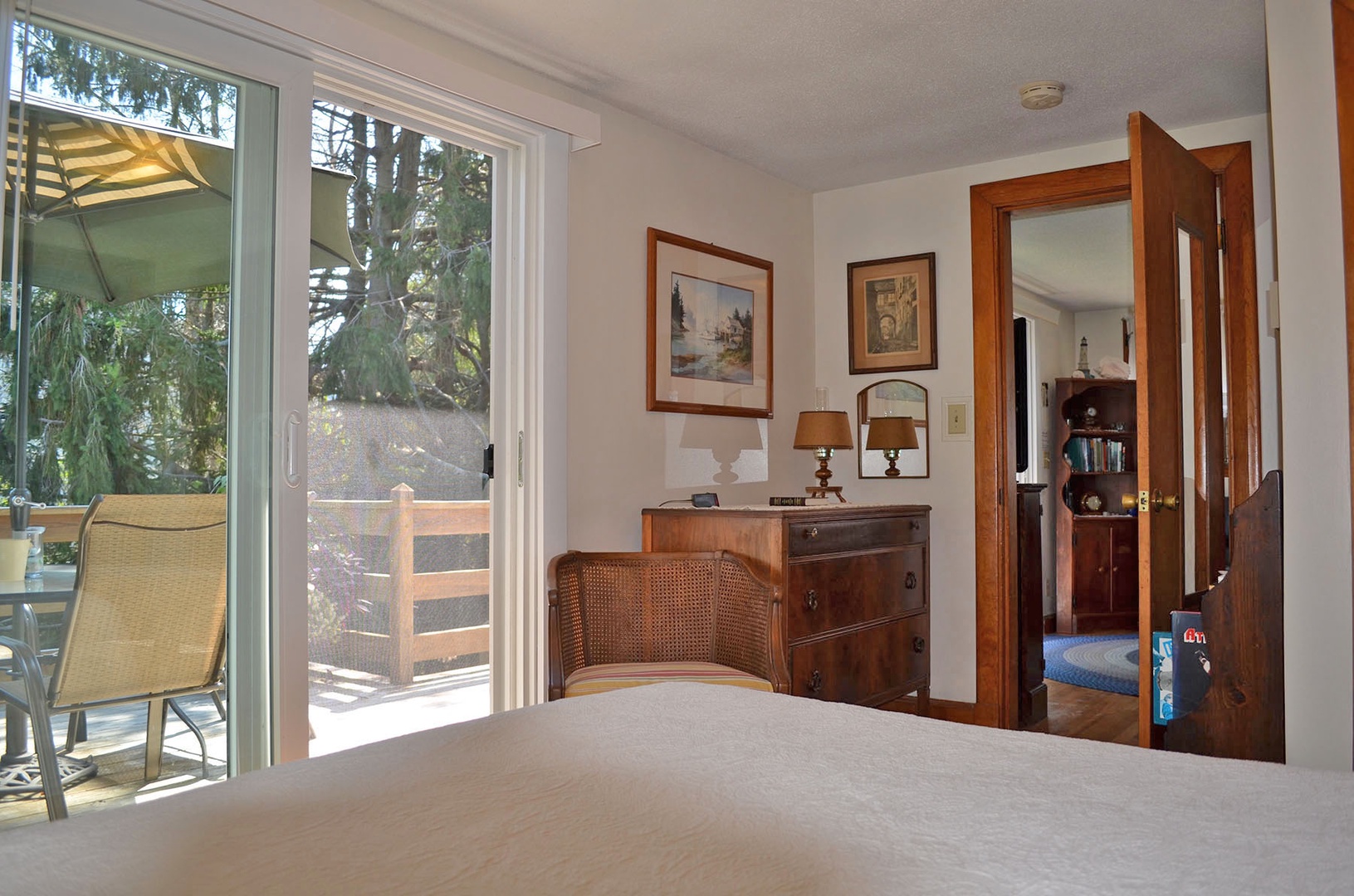 The Primary bedroom has sliding doors to the deck.