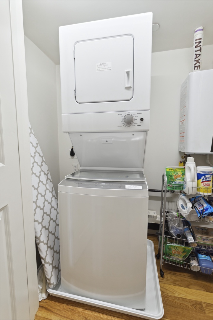 Laundry closet in the hall.