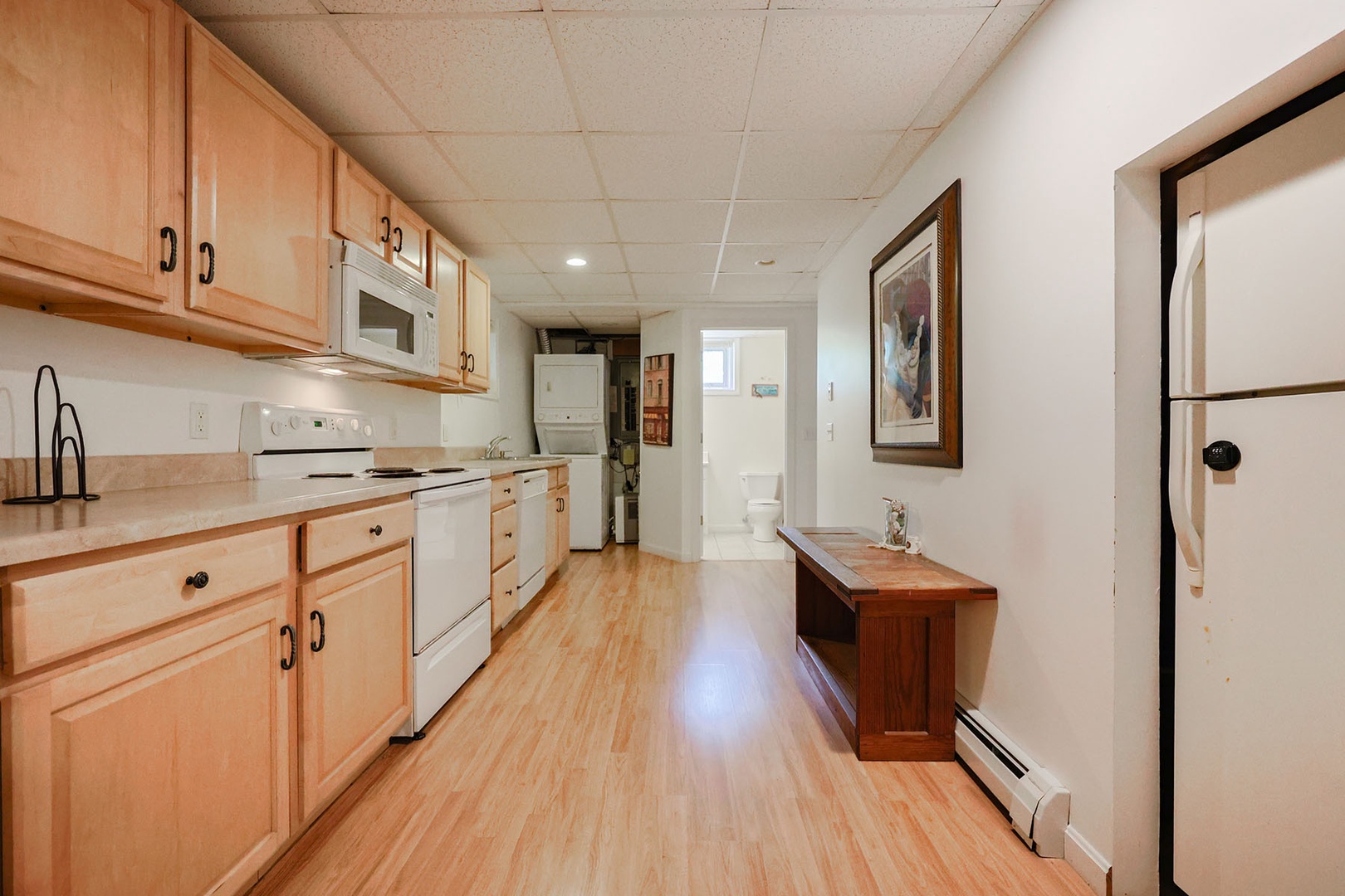 Fully equipped kitchen with plenty of counter space for prep and storage