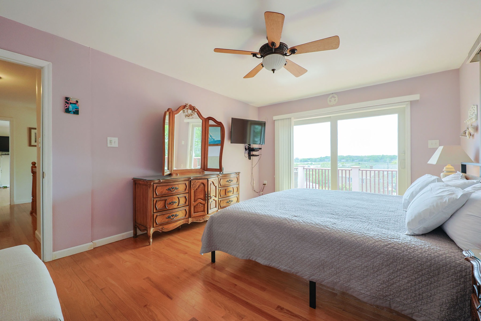 Second bedroom with a king bed and a TV