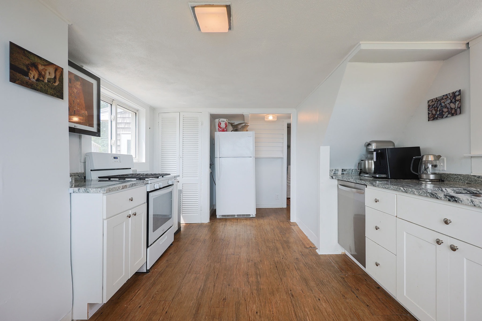 The kitchen has ample space for prep and storage.