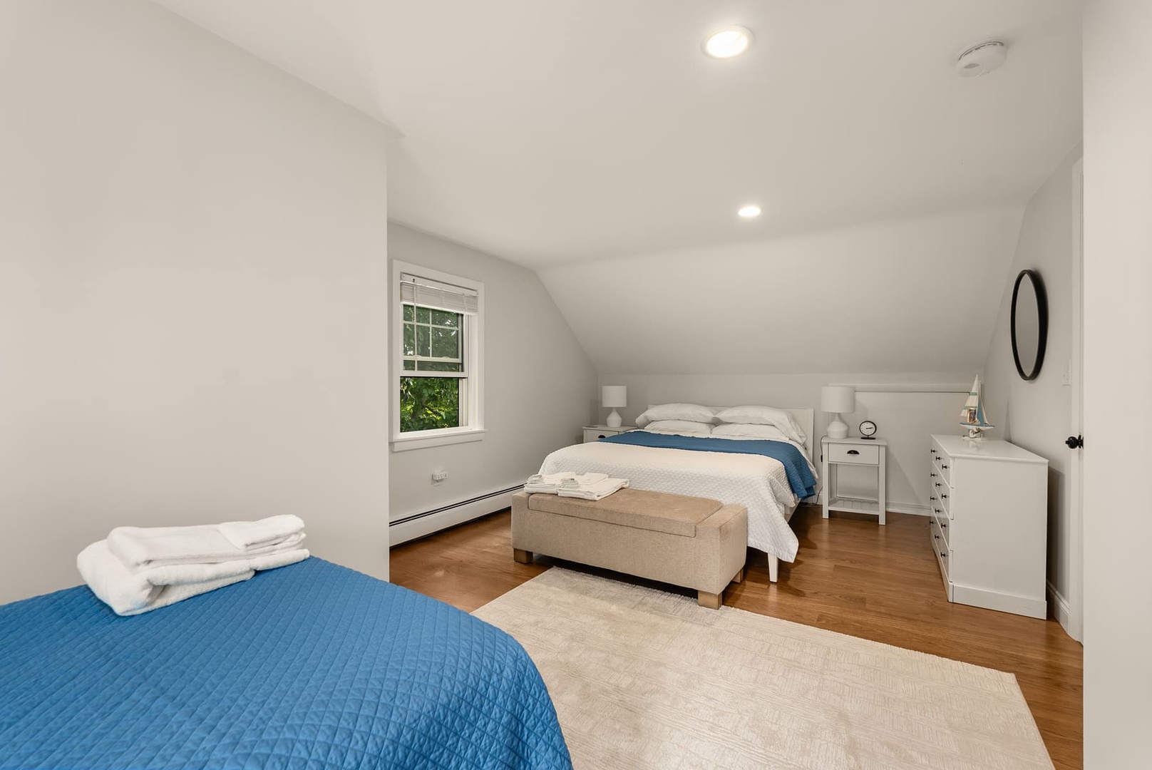 Third bedroom with a full bed and a single twin bed, upstairs.