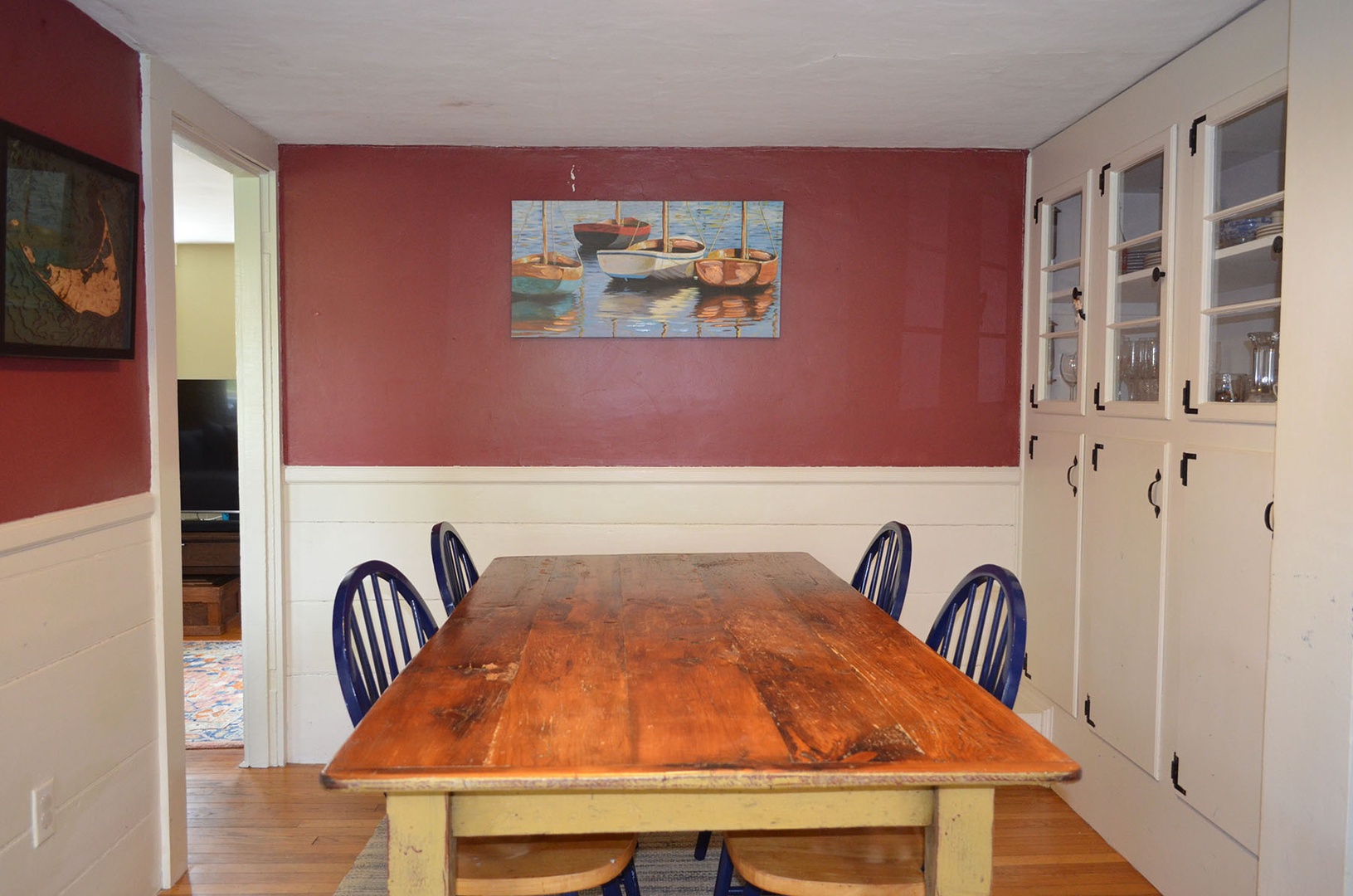 The dining room with its beautiful built-in cabinet.