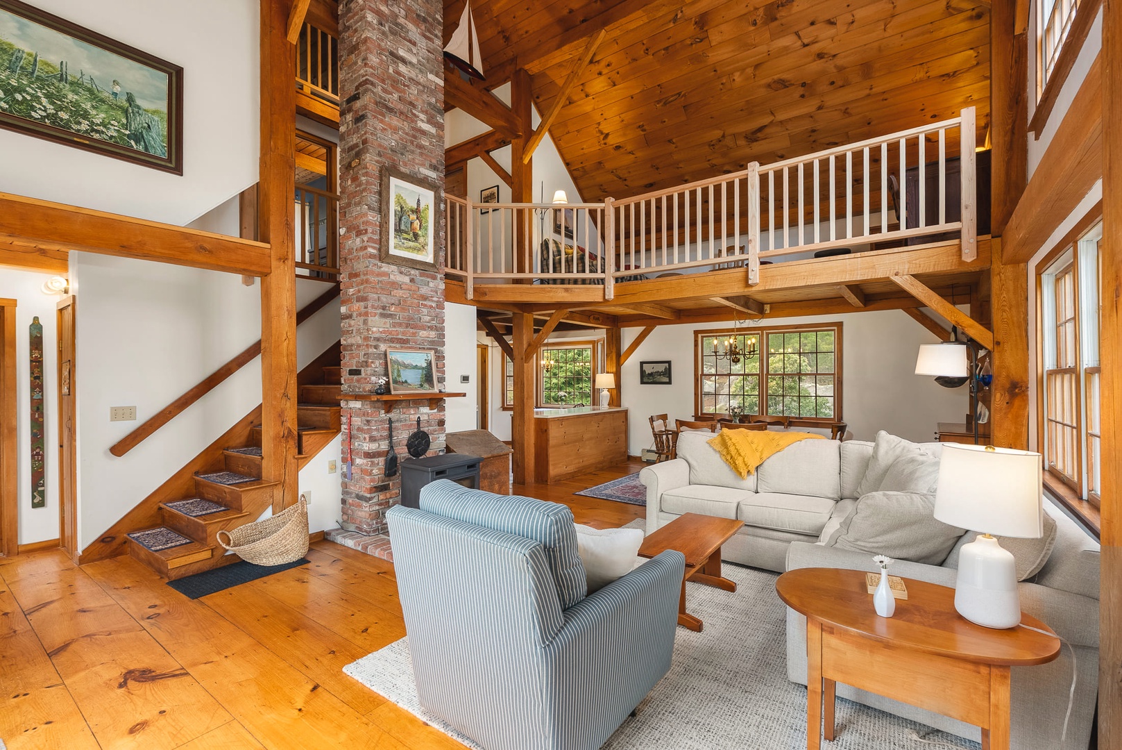 The living room is spacious with comfortable seating.