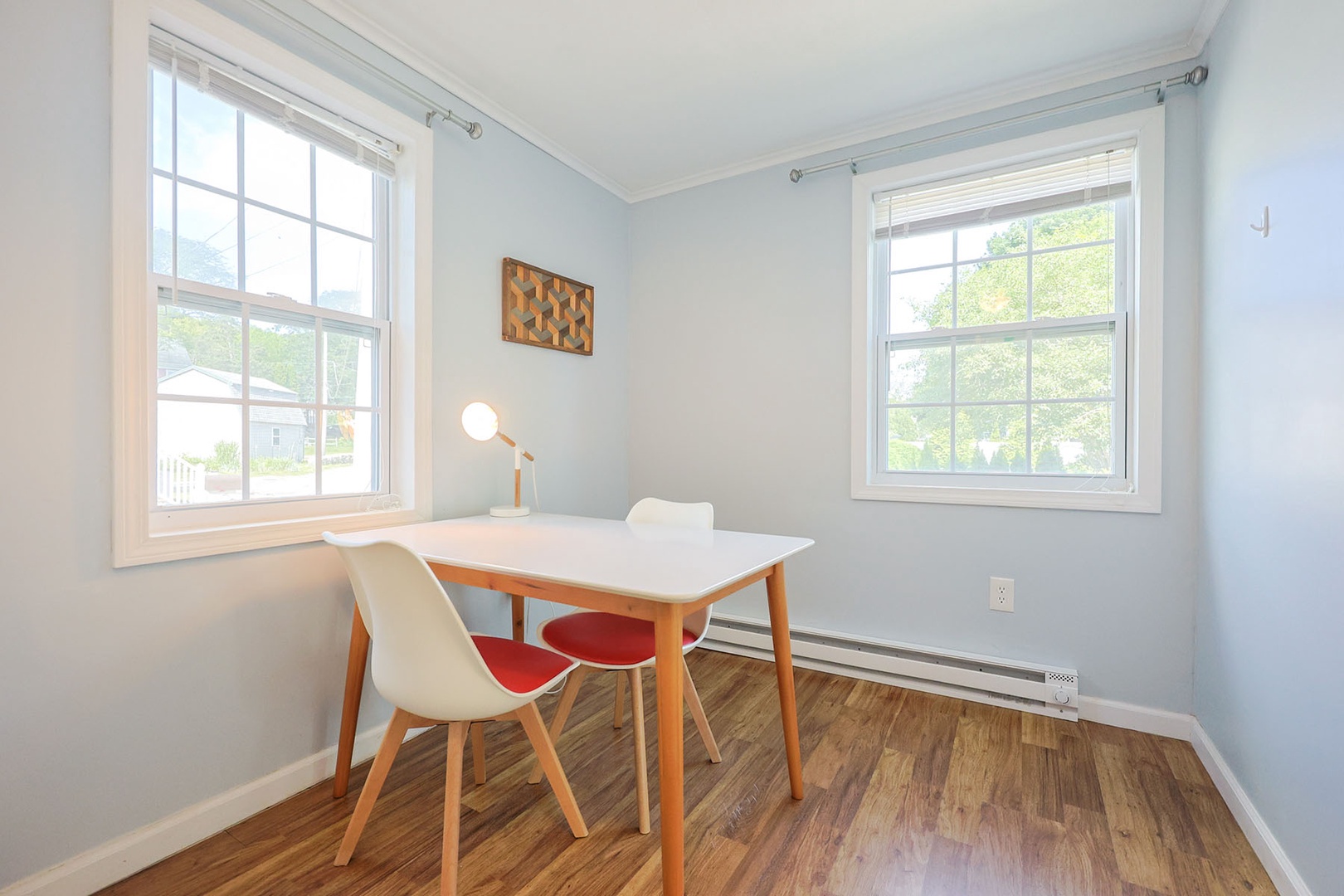 The study with a table and chairs.