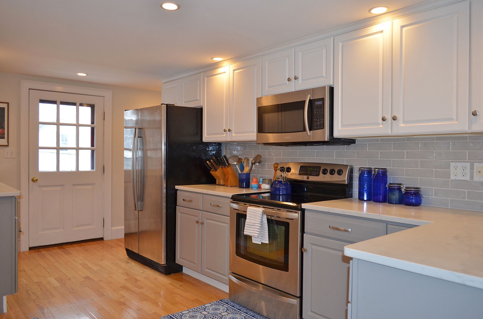 The contemporary kitchen has stainless steel appliances.