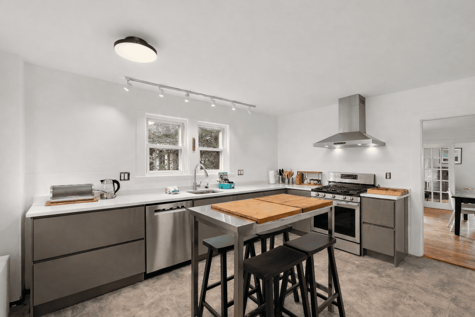 A fully equipped kitchen featuring modern appliances.