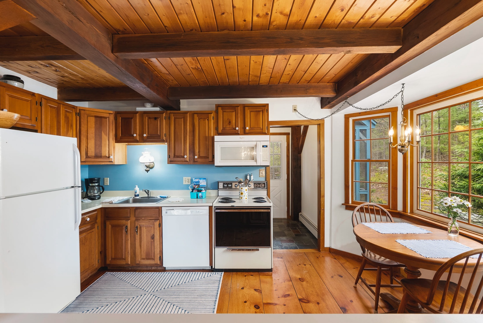 The fully equipped kitchen with modern appliances.