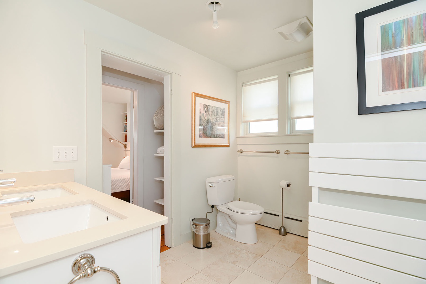This full bathroom is accessible through BR 2 and from the hall.