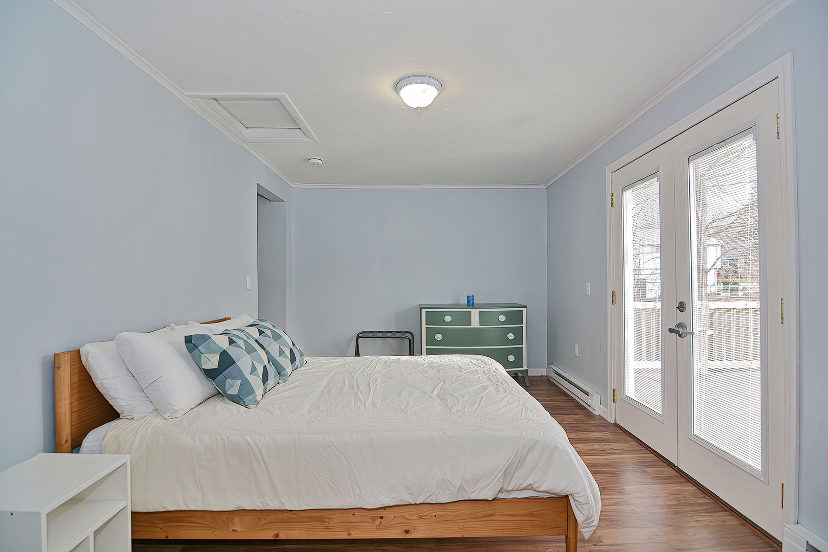 The French doors open to the second deck off the bedroom.