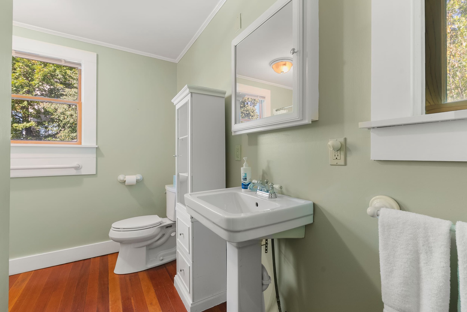 Full Bathroom with a walk-in shower on the first floor.