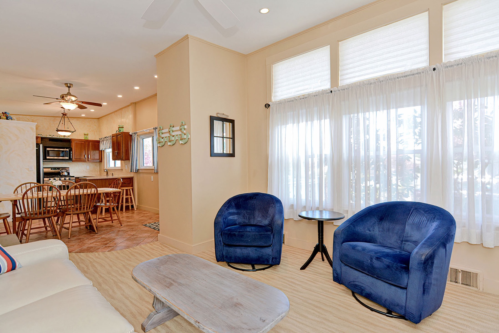 Comfortable seating and large windows with relaxing views outside.