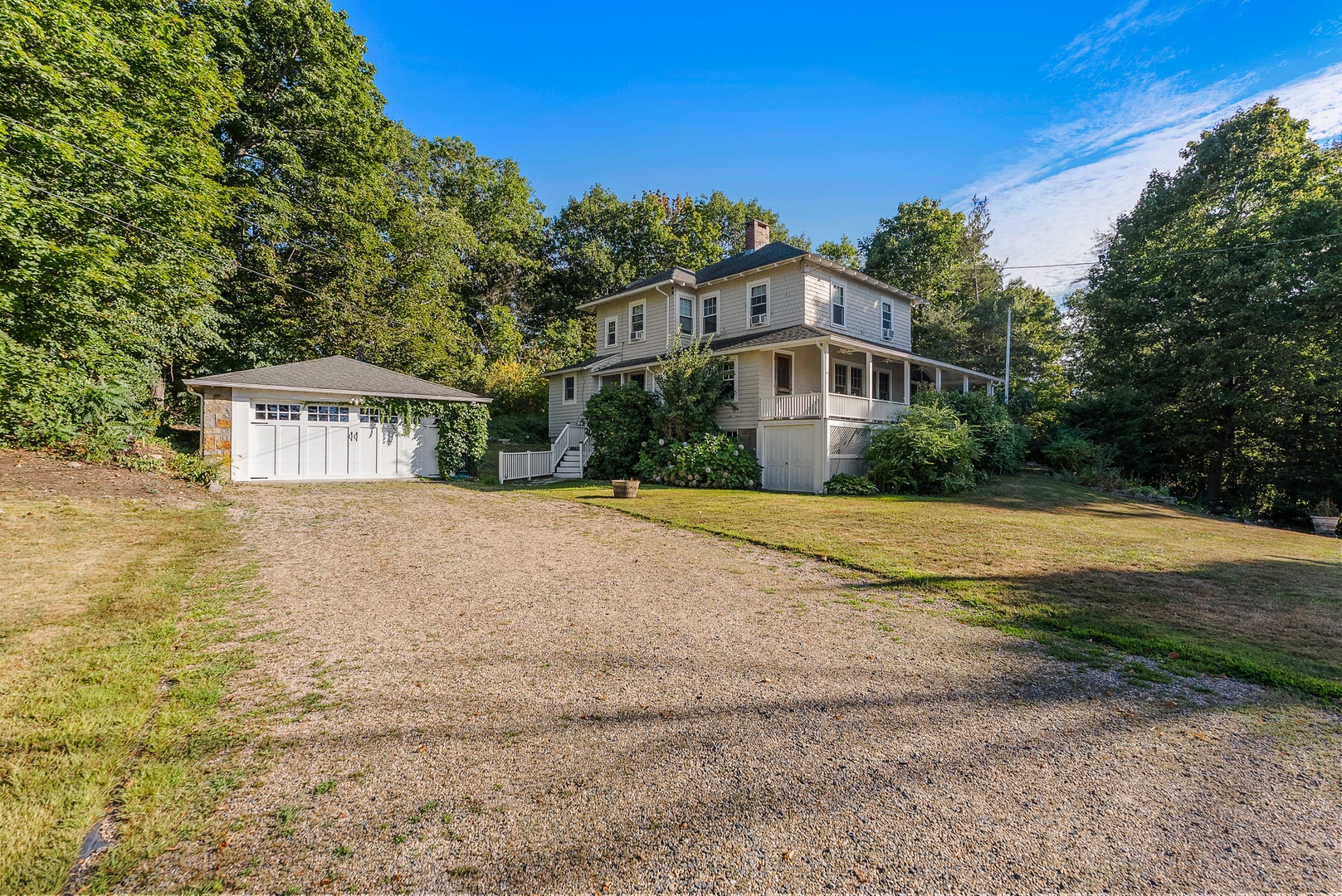 The large driveaway and garage