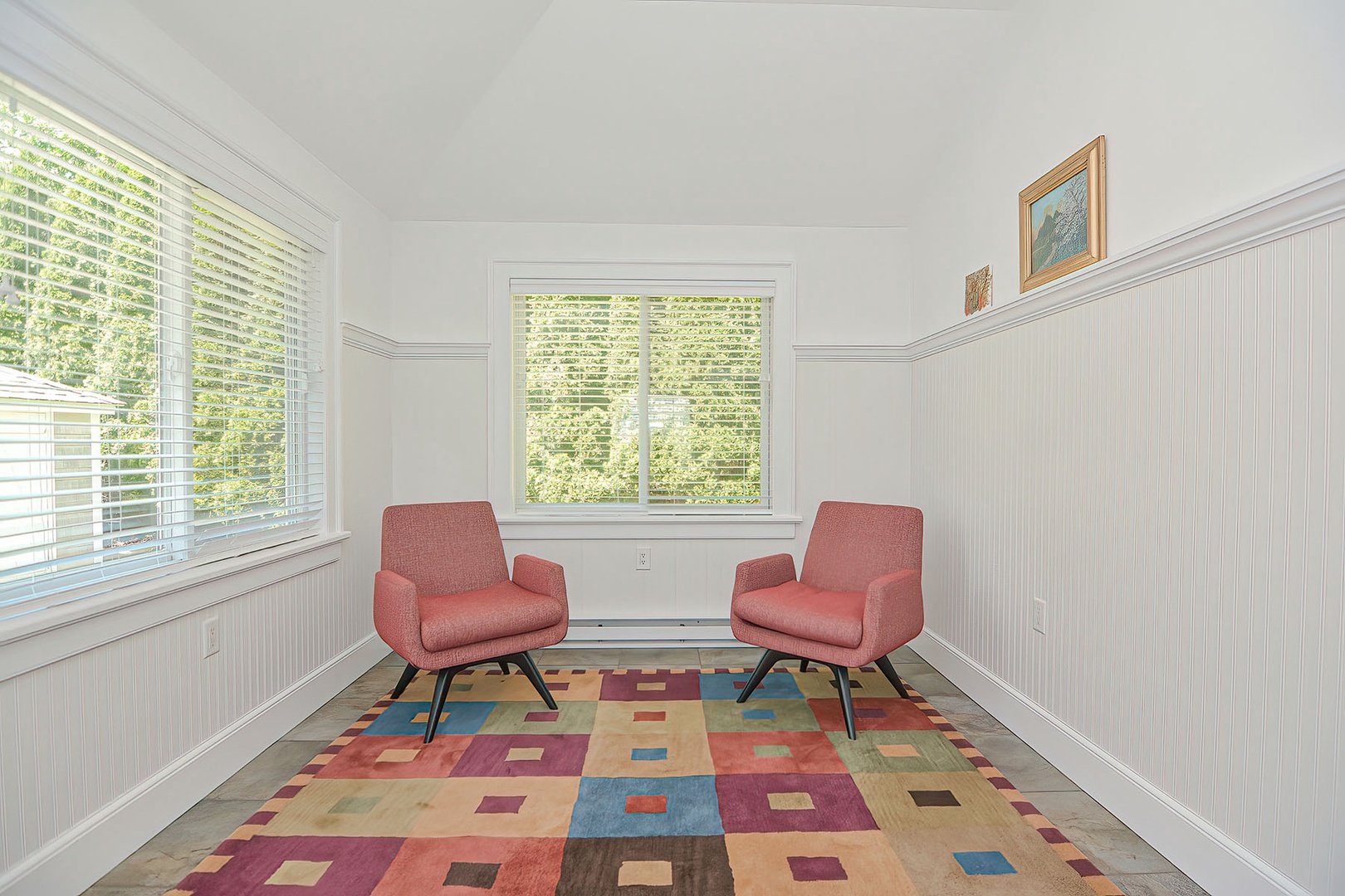 The front porch has a lovely sitting nook.