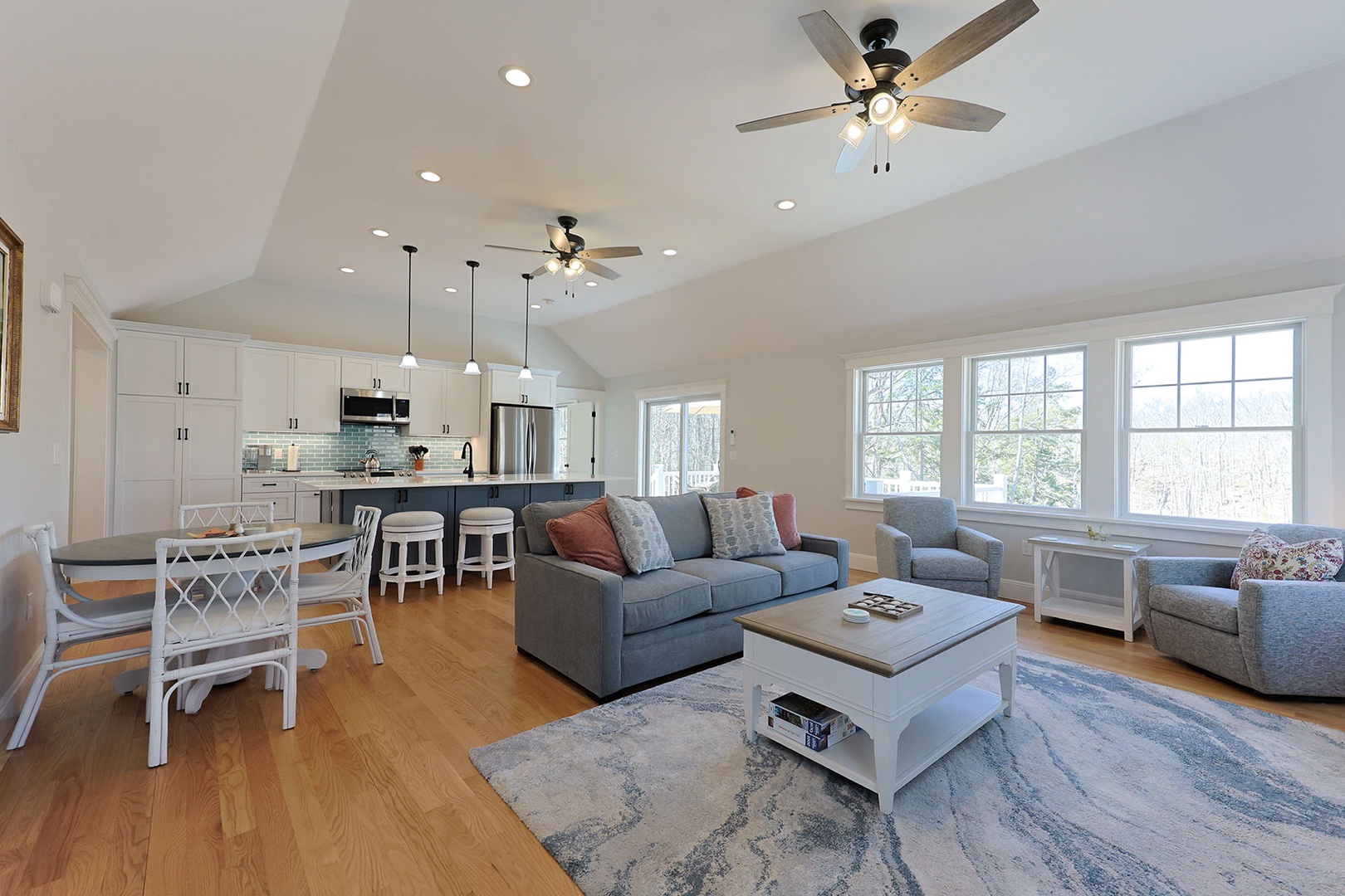 Living room overlooking kitchen area.