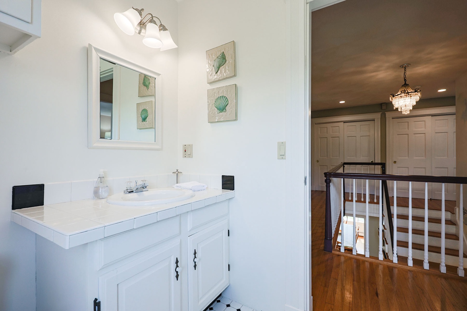 Full bathroom located just off the second floor hall.
