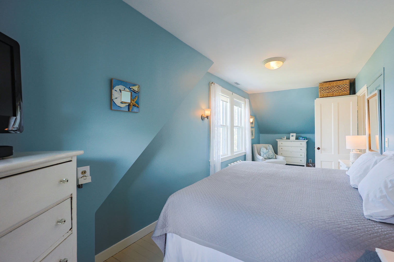 Primary Bedroom: includes a King bed and has river views.