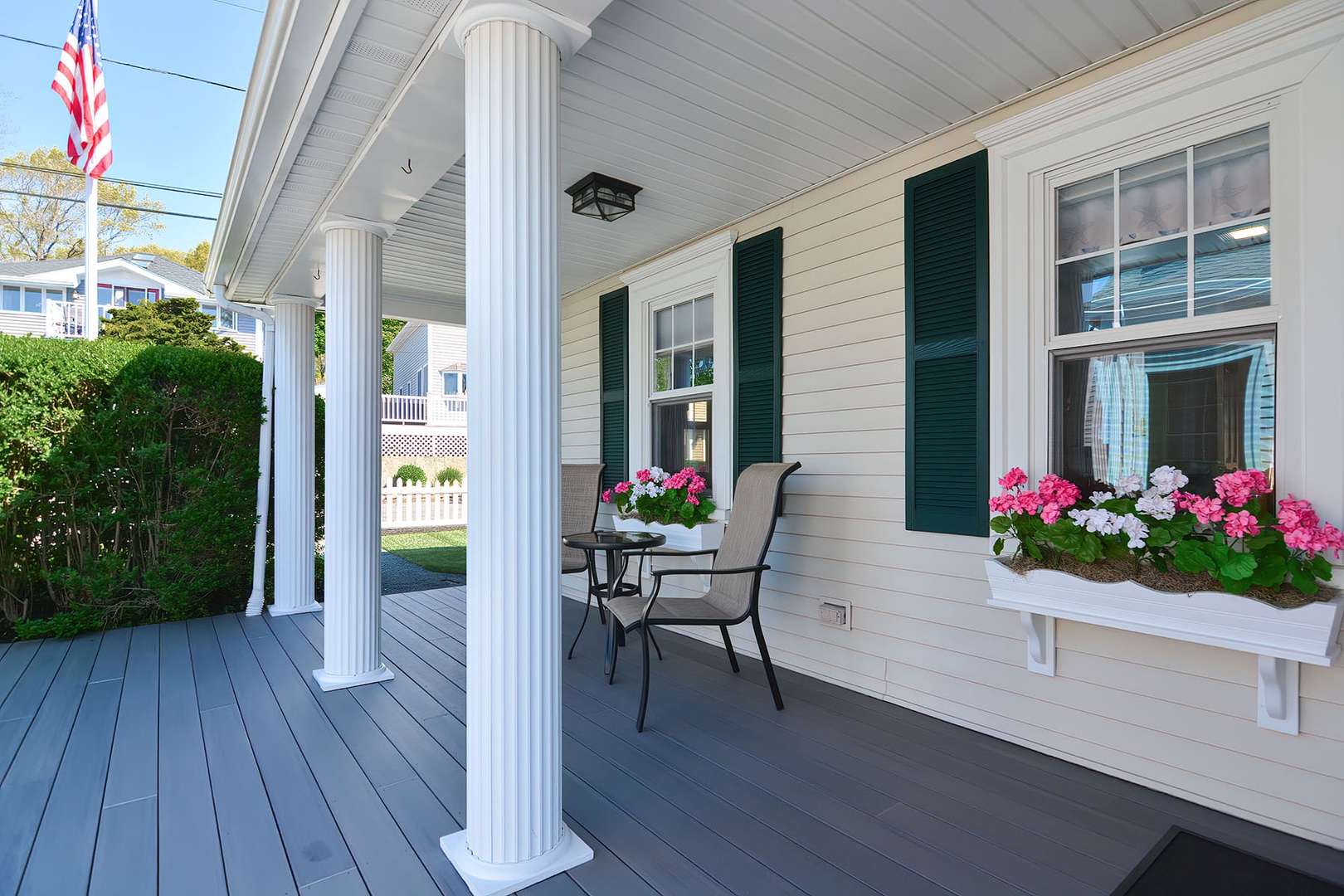 Front porch with two seats.