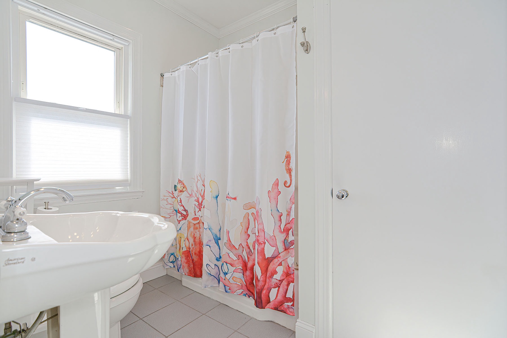 Bathroom 2 with tub/shower combo.