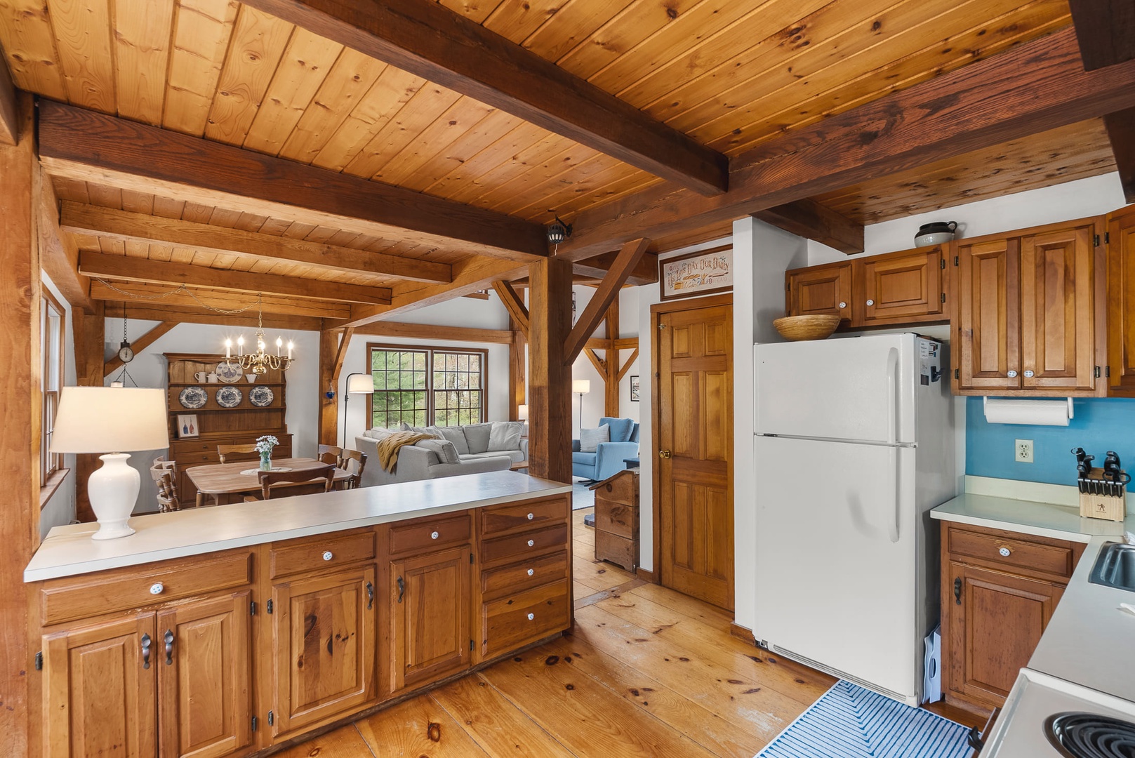 The kitchen has ample counter space and storage for meal prep.