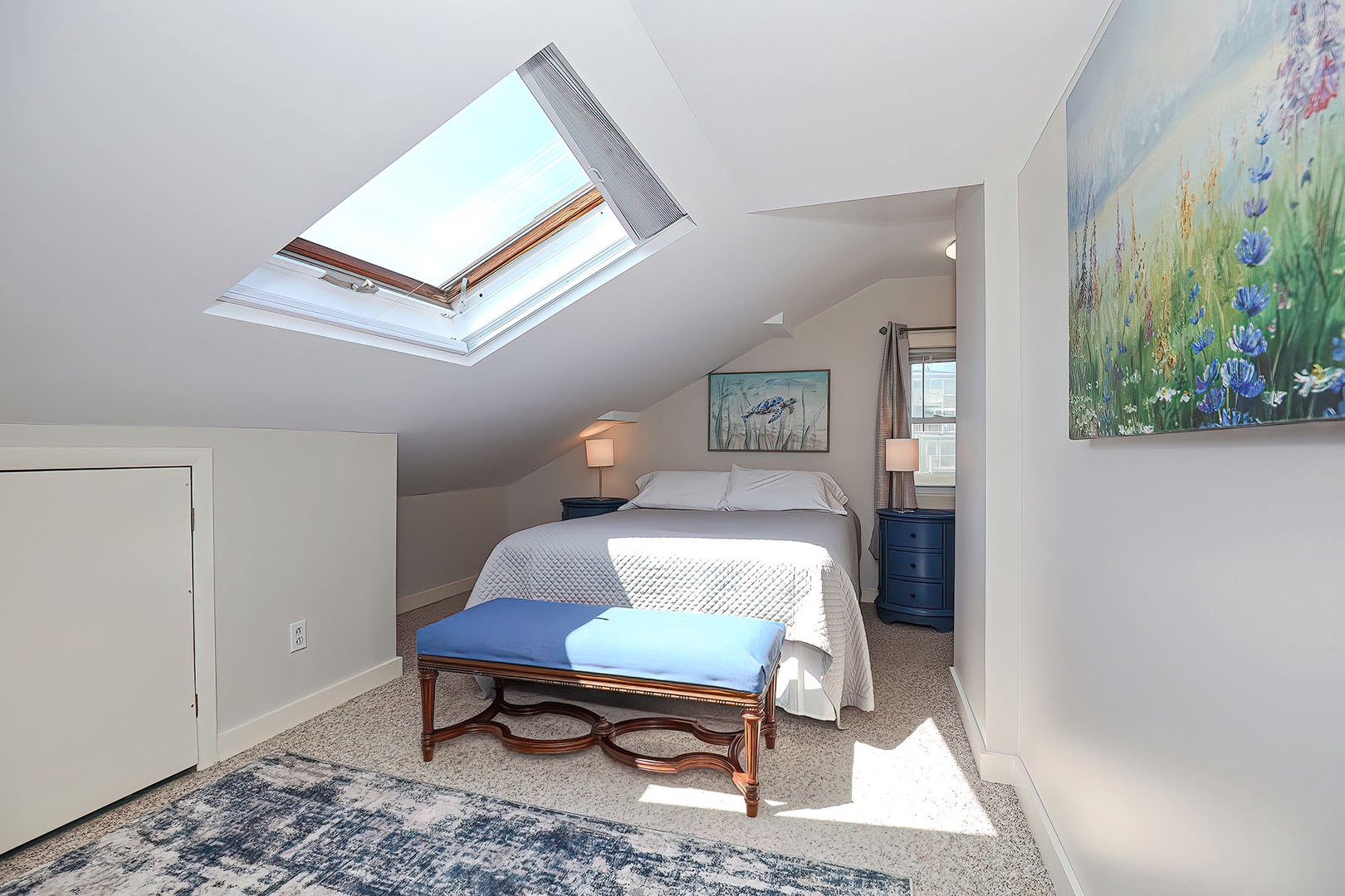 Bedroom 1: Upper level Queen suite.