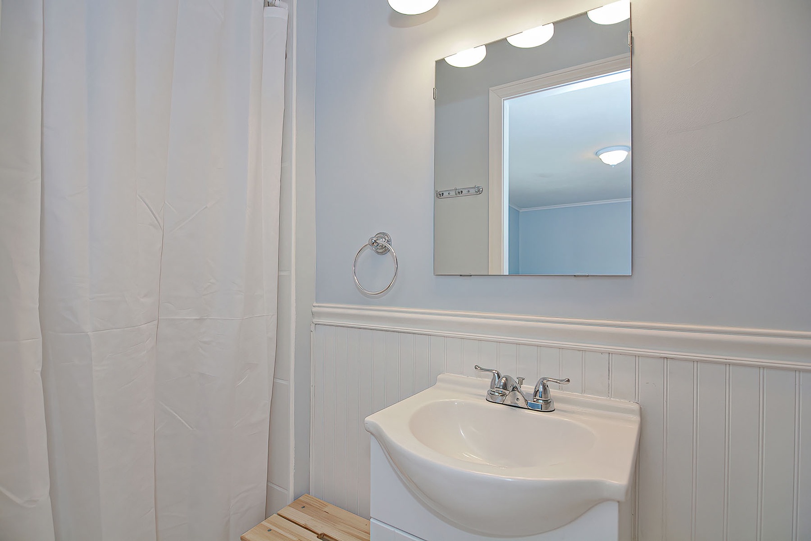 Bathroom 2: The ensuite full bath with walk-in shower.