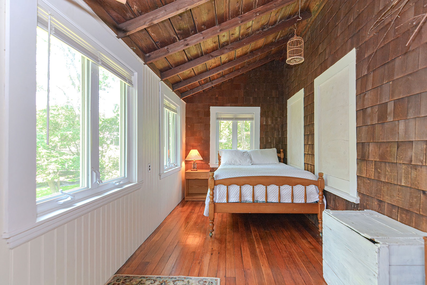 Sun porch contains a Queen and a Twin bed.