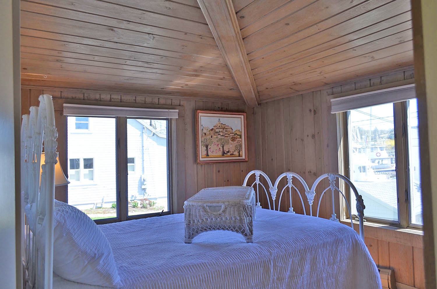 Bedroom 2: This bedroom has a Queen bed and views of Smith Cove.