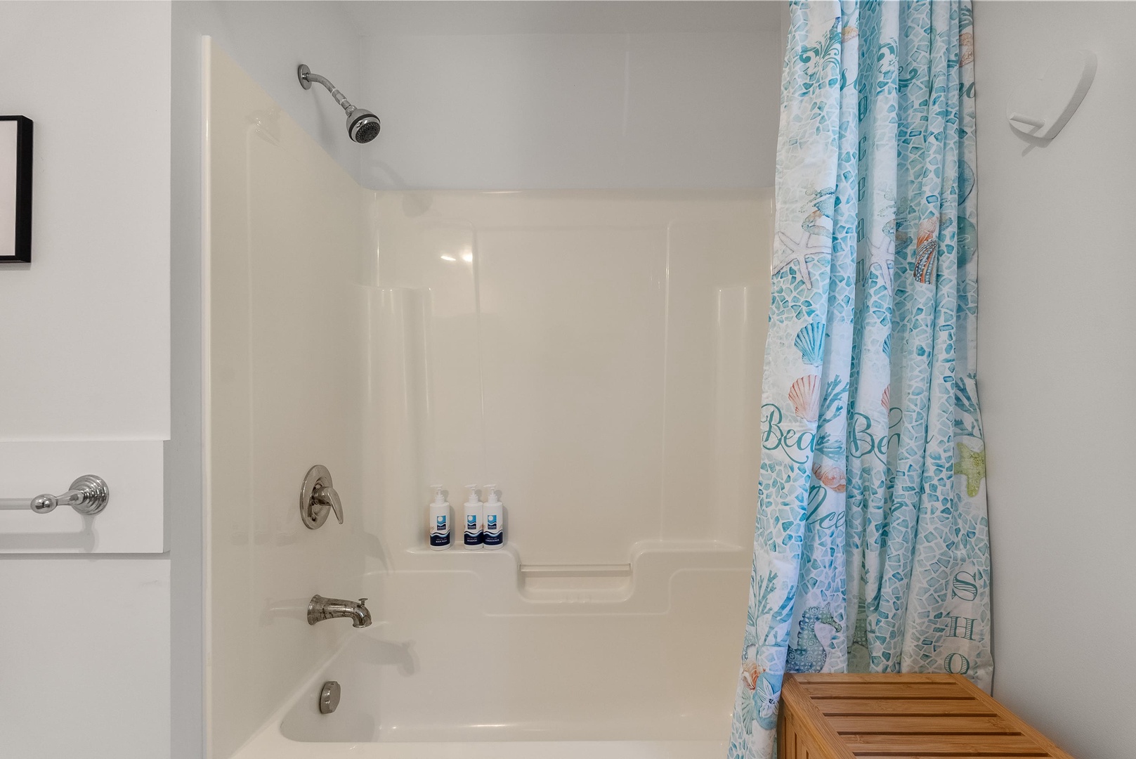 Full Bath across from the Den with walk in shower.