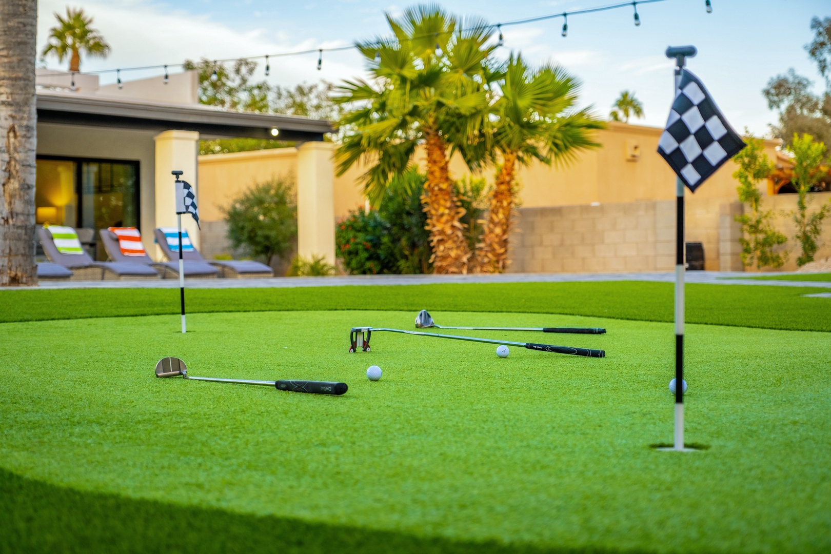 Challenge yourself to a round of putting in your private backyard oasis, where sunshine, palm trees, and leisure await your perfect vacation day.