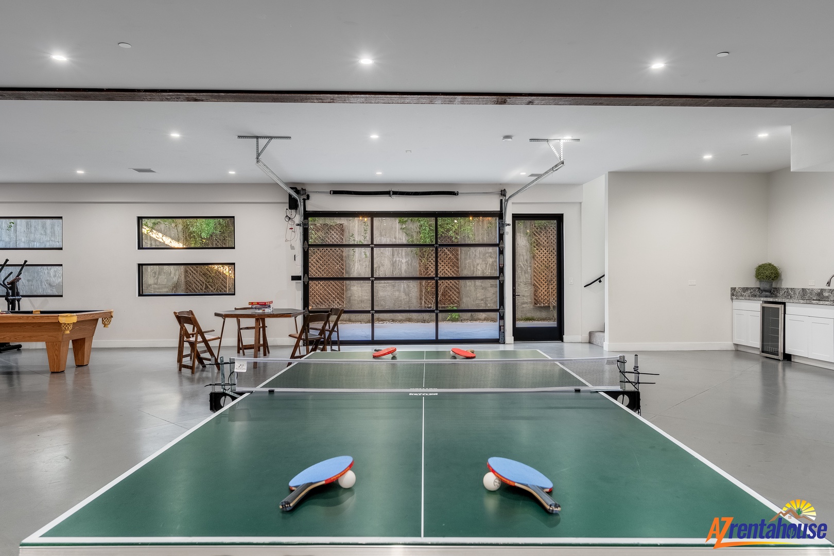 Your private game room awaits with ping pong and pool tables, perfect for friendly competitions and memorable evenings together.