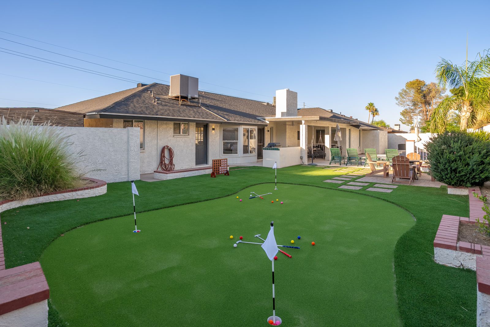 Challenge your friends to a round on your own private putting green, surrounded by palm trees and mountain views under endless Arizona skies.