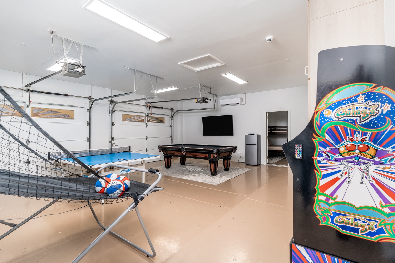 Step into your private game room where friendly competition awaits—challenge your crew to pool, ping-pong, arcade fun, and endless laughter in this entertainment-packed space.